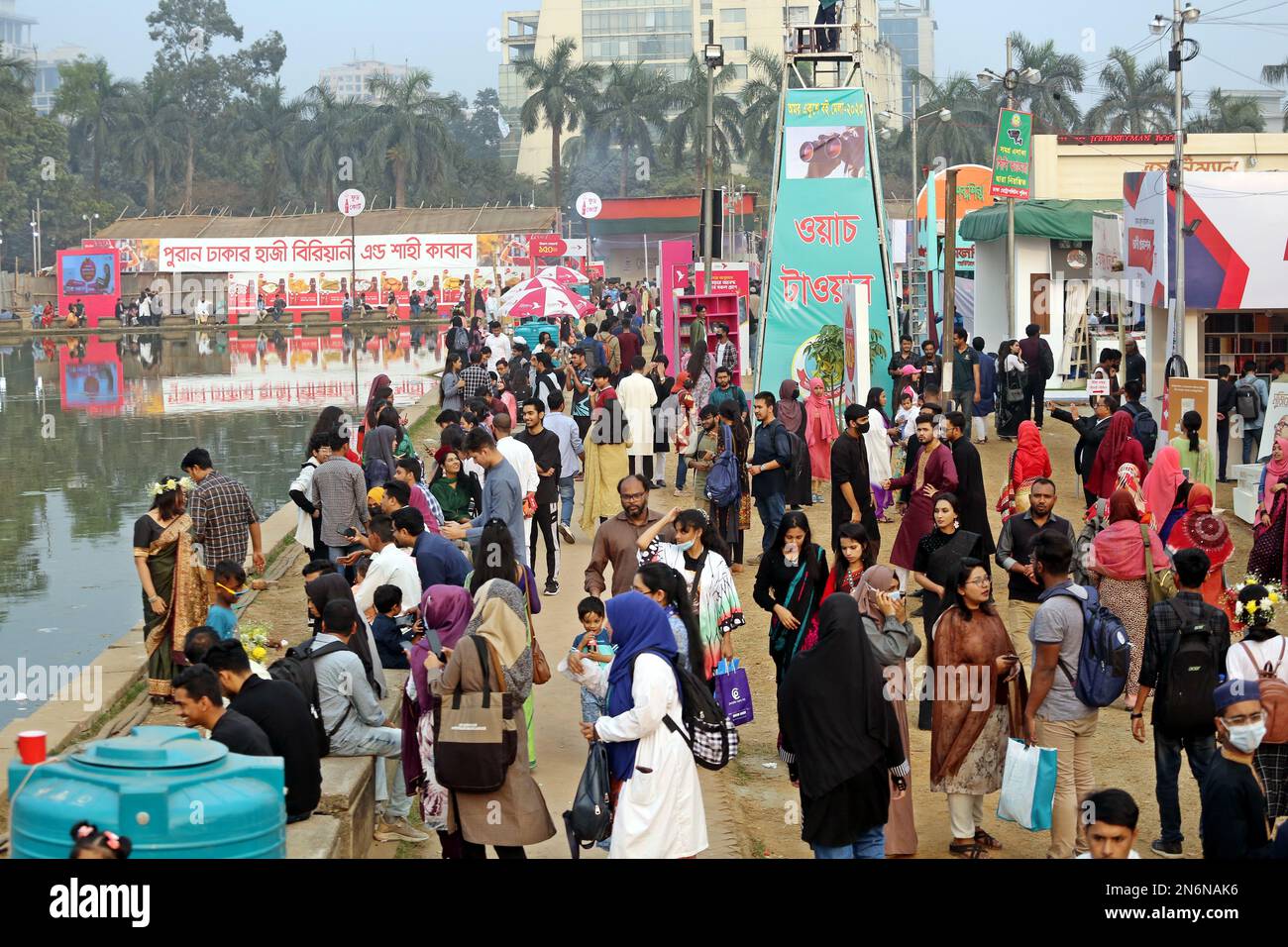 Dhaka, Bangladesh, February 9, 2023. Visitors read books at the