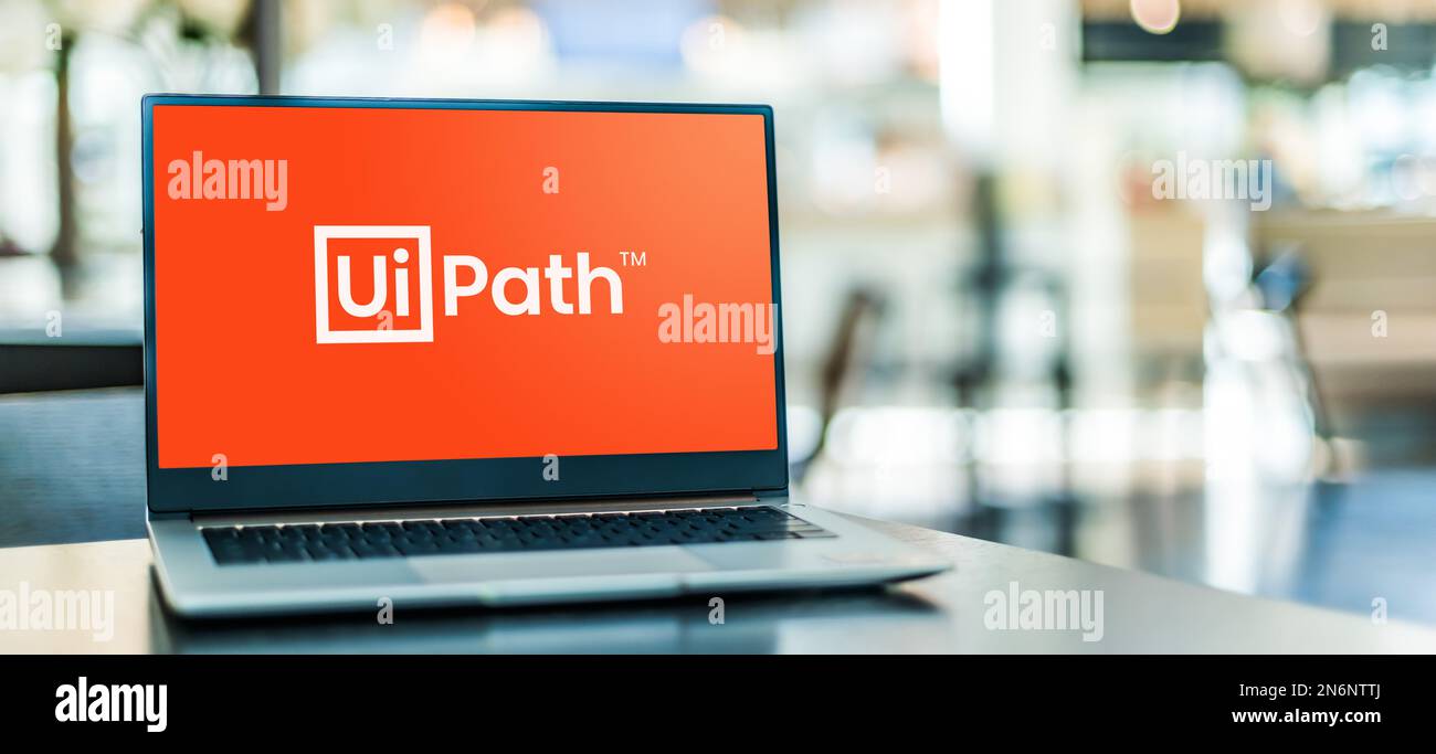 POZNAN, POL - MAY 4, 2022: Laptop computer displaying logo of UiPath, a global software company that makes robotic process automation software Stock Photo