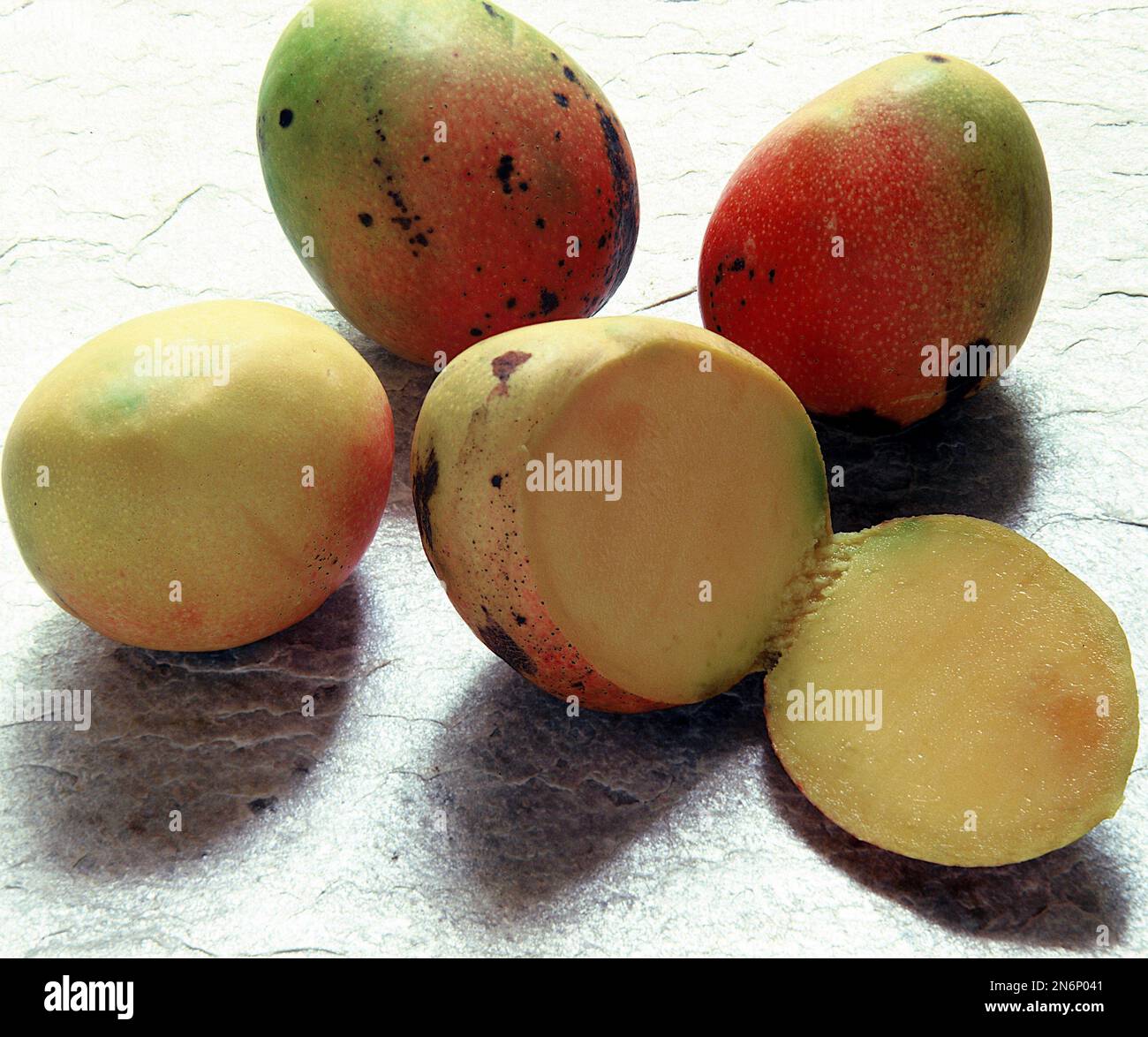 Large Ripe Round Mango Four ripe mangos hi-res stock photography and images - Alamy