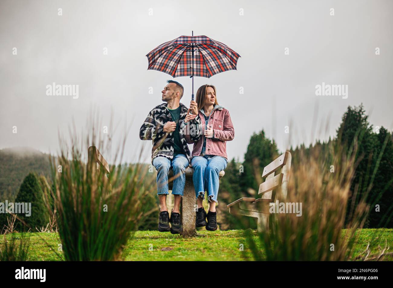 Under the Umbrella, Two Hearts in Harmony Stock Photo