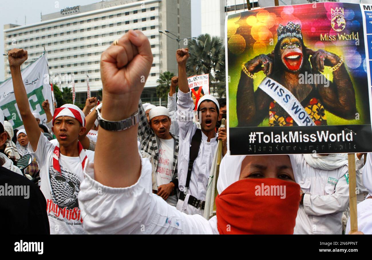A Muslim woman chants slogans during a protest with others demanding ...