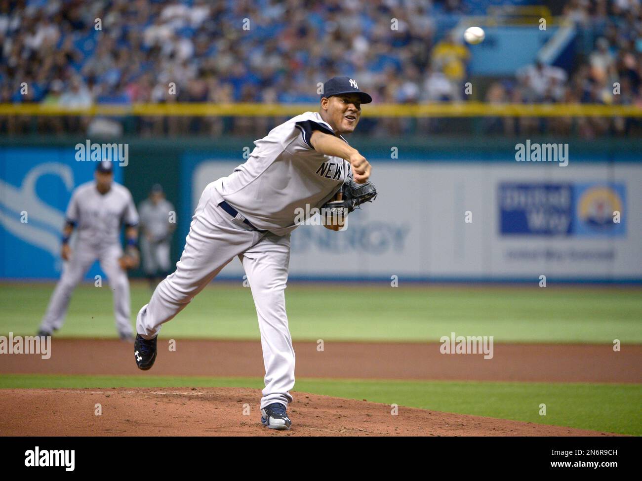 New York Yankees starting pitcher Ivan Nova, right, throws to home