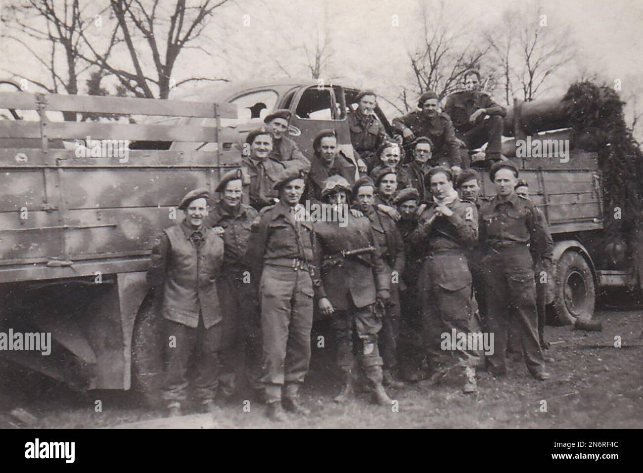 Uelan, Germany 1945, 11th armoured division troops in front of a german transporter that had been shot by typhoons Stock Photo