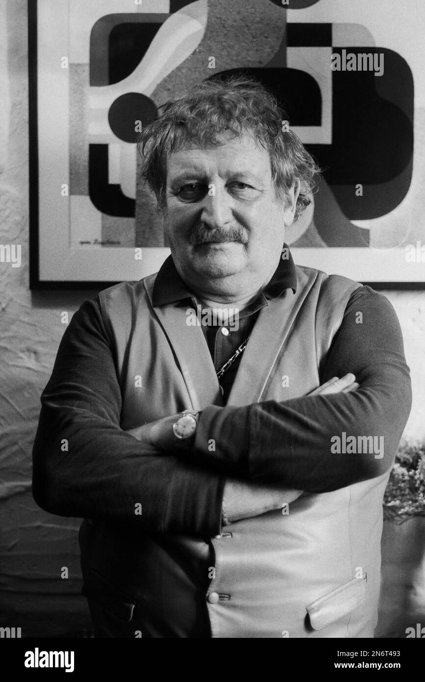 French actor Jacques Fabbri poses at home, Paris, France, 1989 Stock