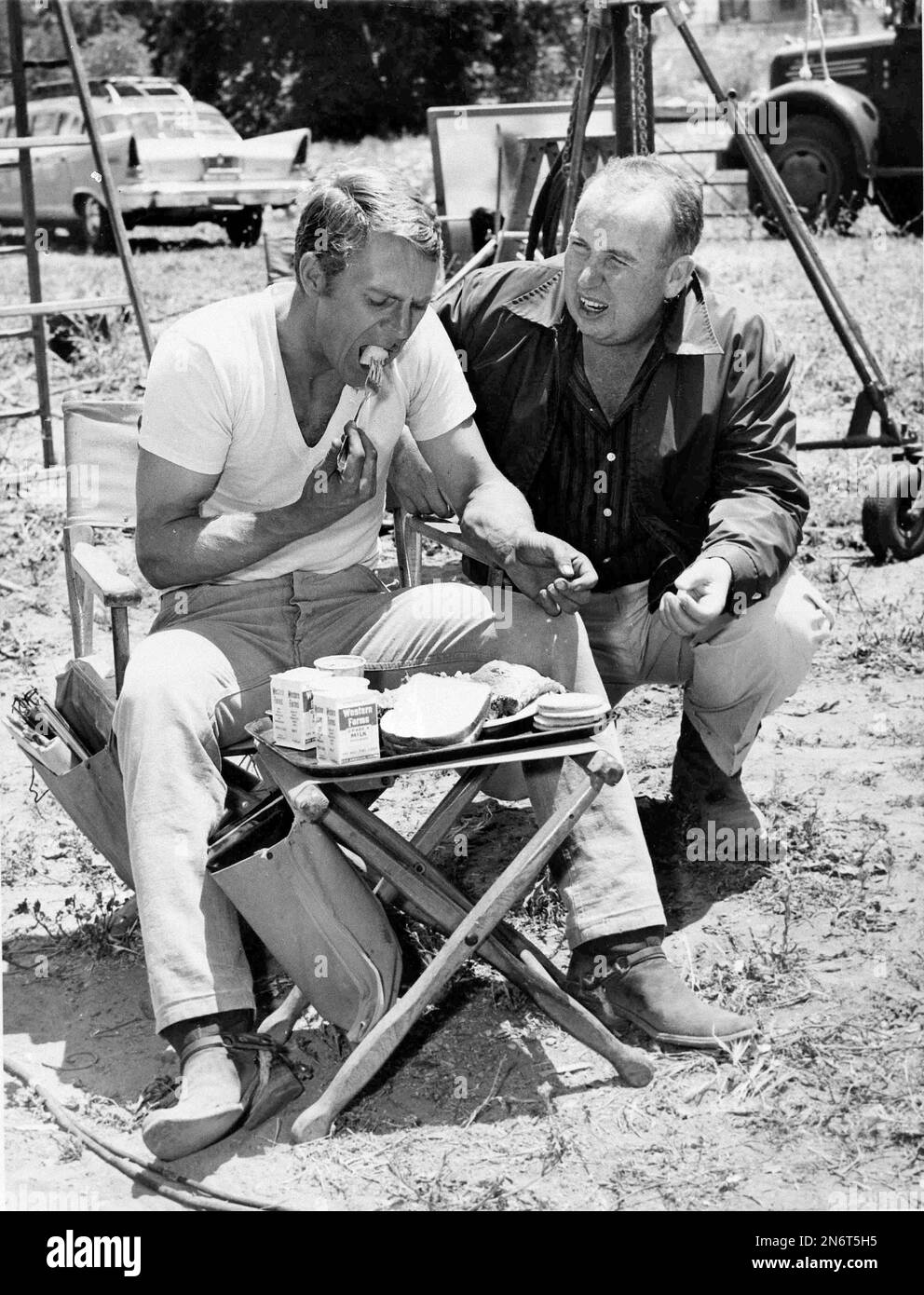Director Don McDougall gets a point over while actor Steve McQueen