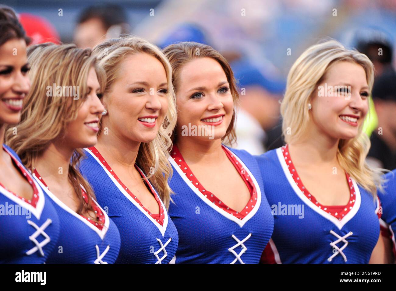 Buffalo Bills cheerleaders pose for photographs during the first half