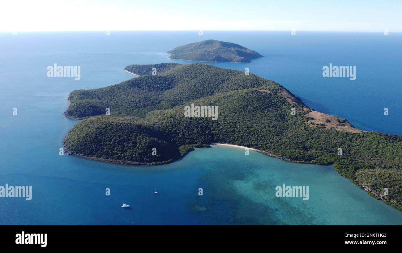 Aerial view of Orpheus Island in the Palm Islands, Queesland. Known as Goolboddi to the traditiional owners. Pelorus Island is in the background Stock Photo