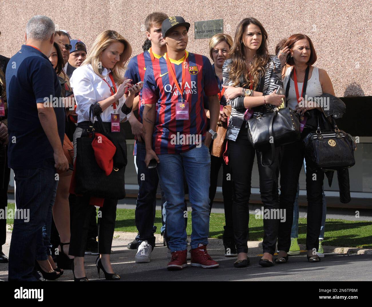 In this photo taken of Monday, June 3, 2013, Bruna Marquezine, actress and  girlfriend of Brazilian soccer player Neymar, right, attends the Neymar  presentation as official F.C Barcelona player at the Camp, image size:1300x1071