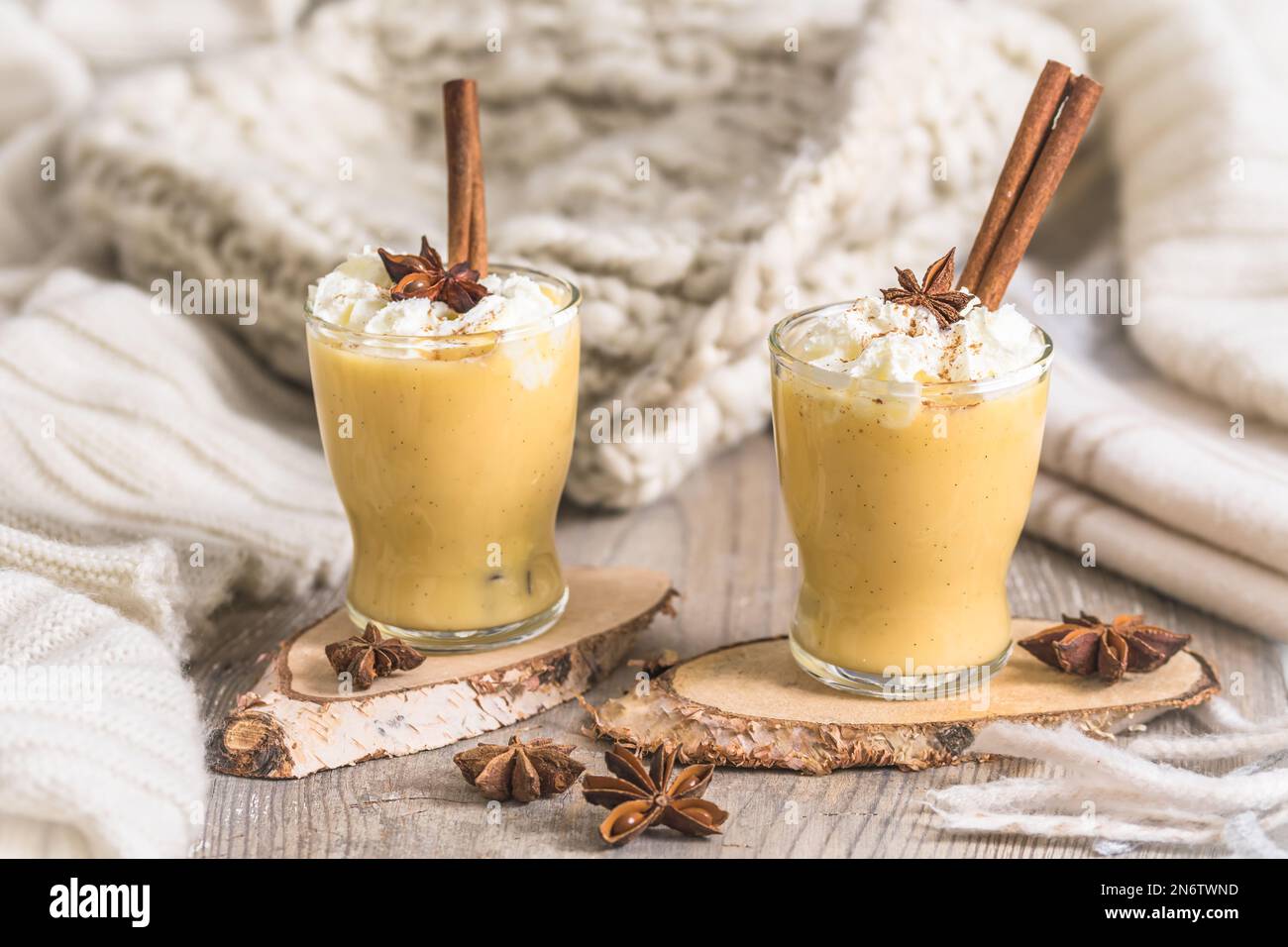 Two glasses of eggnogg with whipped cream and cinnamon. Auld Man's milk ...