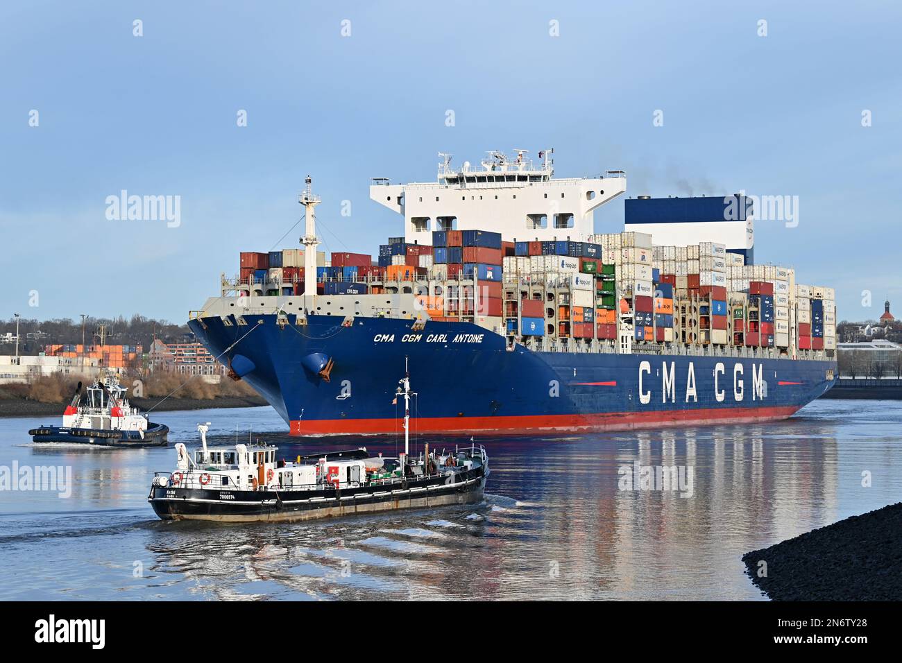 Containership CMA CGM CARL ANTOINE arrives at the port of Hamburg Stock Photo