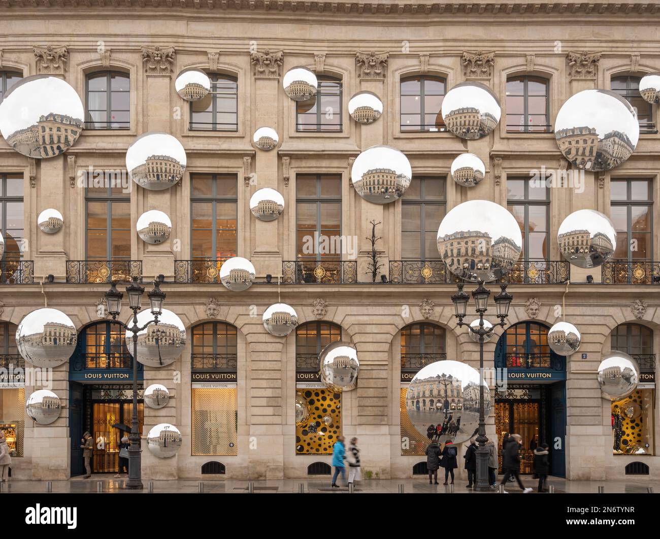 Place vendome. View of the facade of Louis Vuitton with lots of mirrors  reflecting the buildings around Stock Photo - Alamy