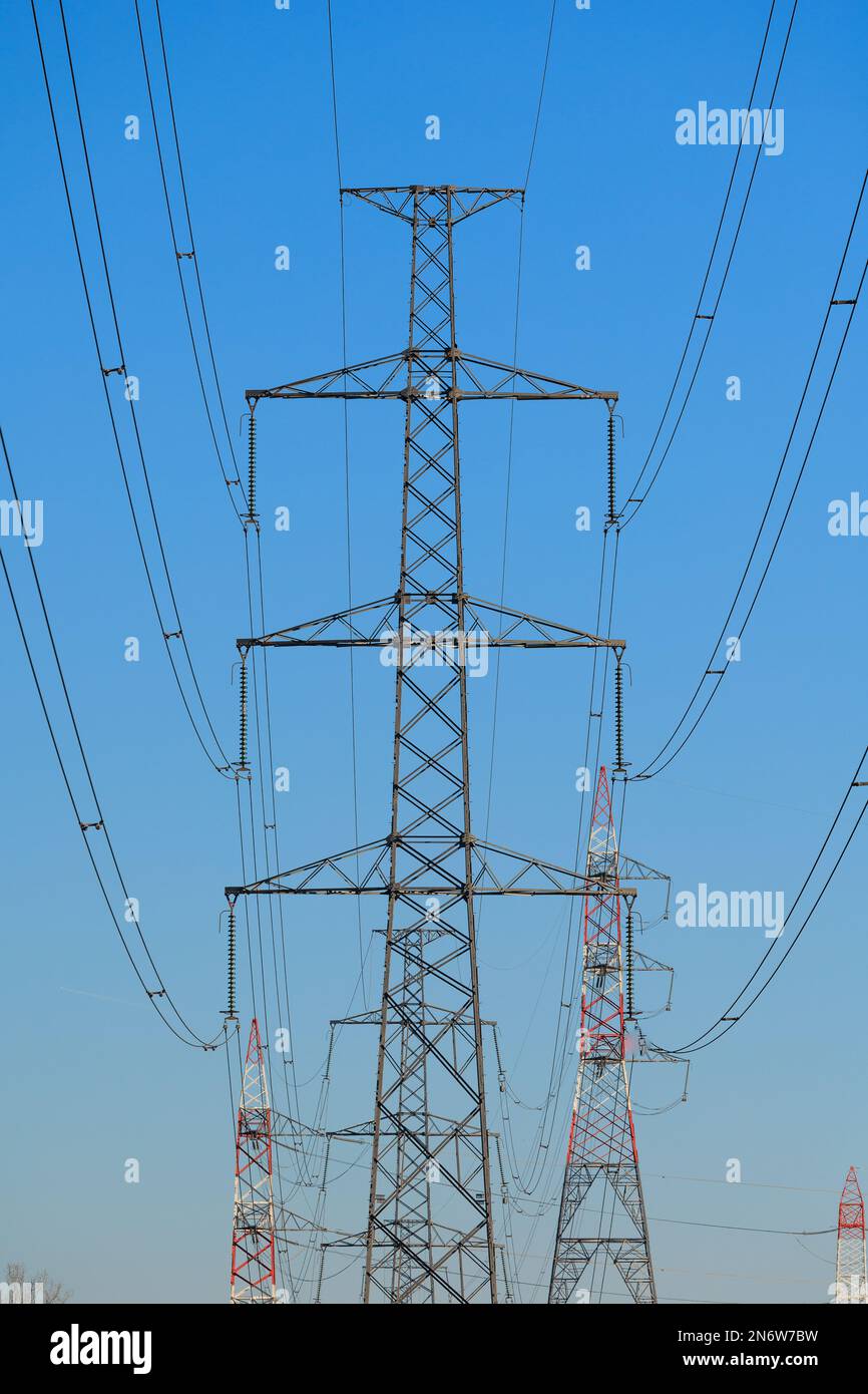 High voltage power lines in the countryside Stock Photo - Alamy