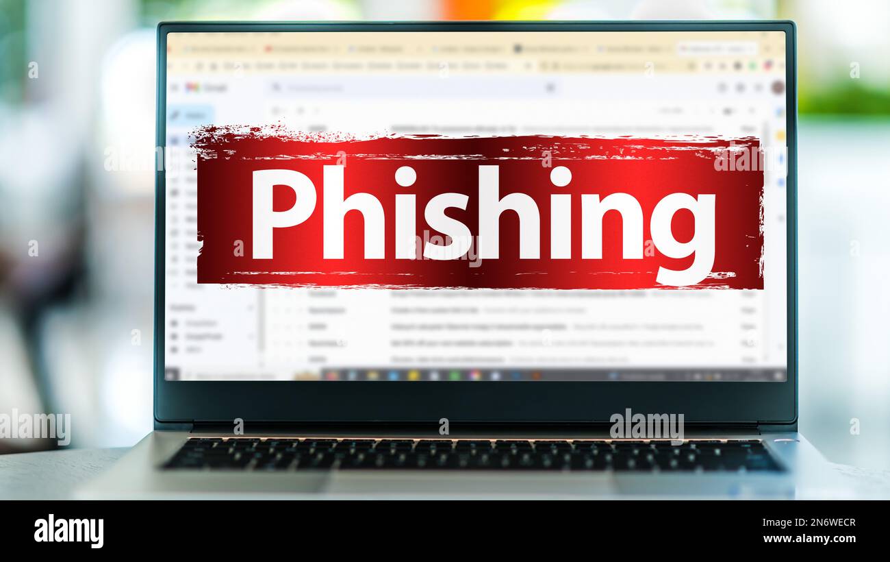 Laptop computer displaying the sign of phishing on an internet email ...