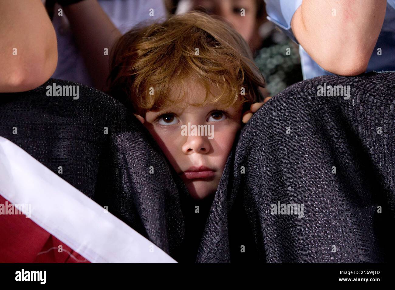 Jimmy Teti, 4, listens as President Barack Obama speaks about college  financial aid at Henninger High School in Syracuse, N.Y., Thursday, Aug.  22, 2013, on the first day of a two day, image size:1300x956
