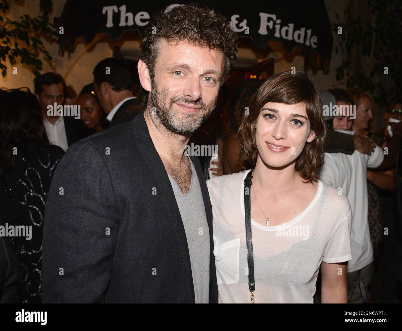 From left to right, actor Michael Sheen and actress Lizzy Caplan attend the after party for the