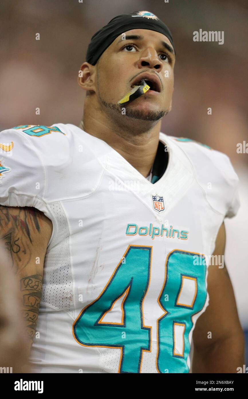Miami Dolphins' Evan Rodriguez watches from the sidelines during the first  half of a preseason NFL football game against the Houston Texans Saturday,  Aug. 17, 2013, in Houston. (AP Photo/Eric Gay Stock, image size:866x1390