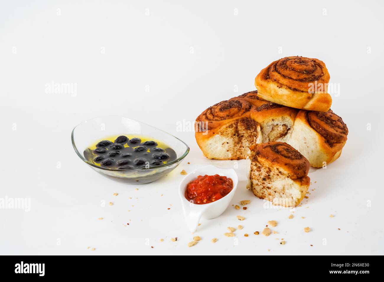 Salty bread with walnut poppy sesame, black olives and chili tomato