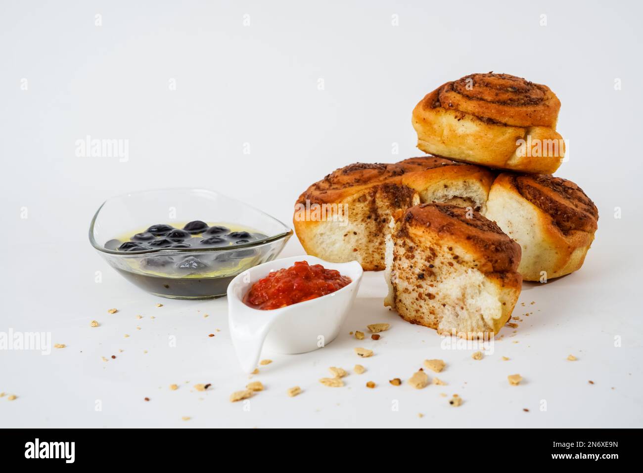 Salty bread with walnut poppy sesame, black olives and chili tomato