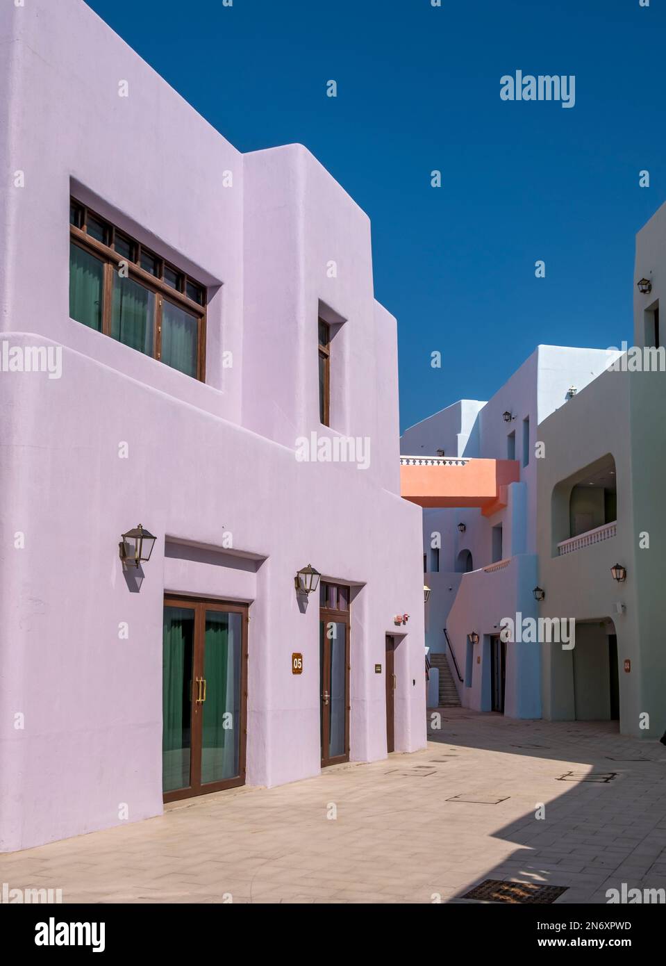 Brightly painted houses, Mina District, Old Doha Port, Qatar Stock