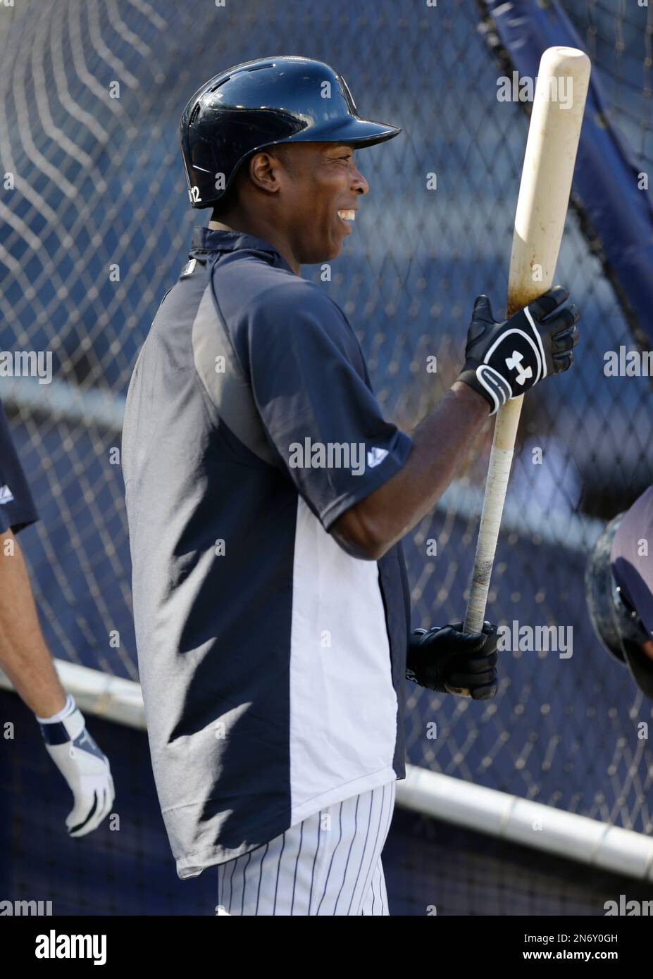 New York Yankees Alfonso Soriano stands by the batting cage with a smile on  his face before a baseball game against the Los Angeles Angels, Wednesday,  Aug. 14, 2013, in New York. (