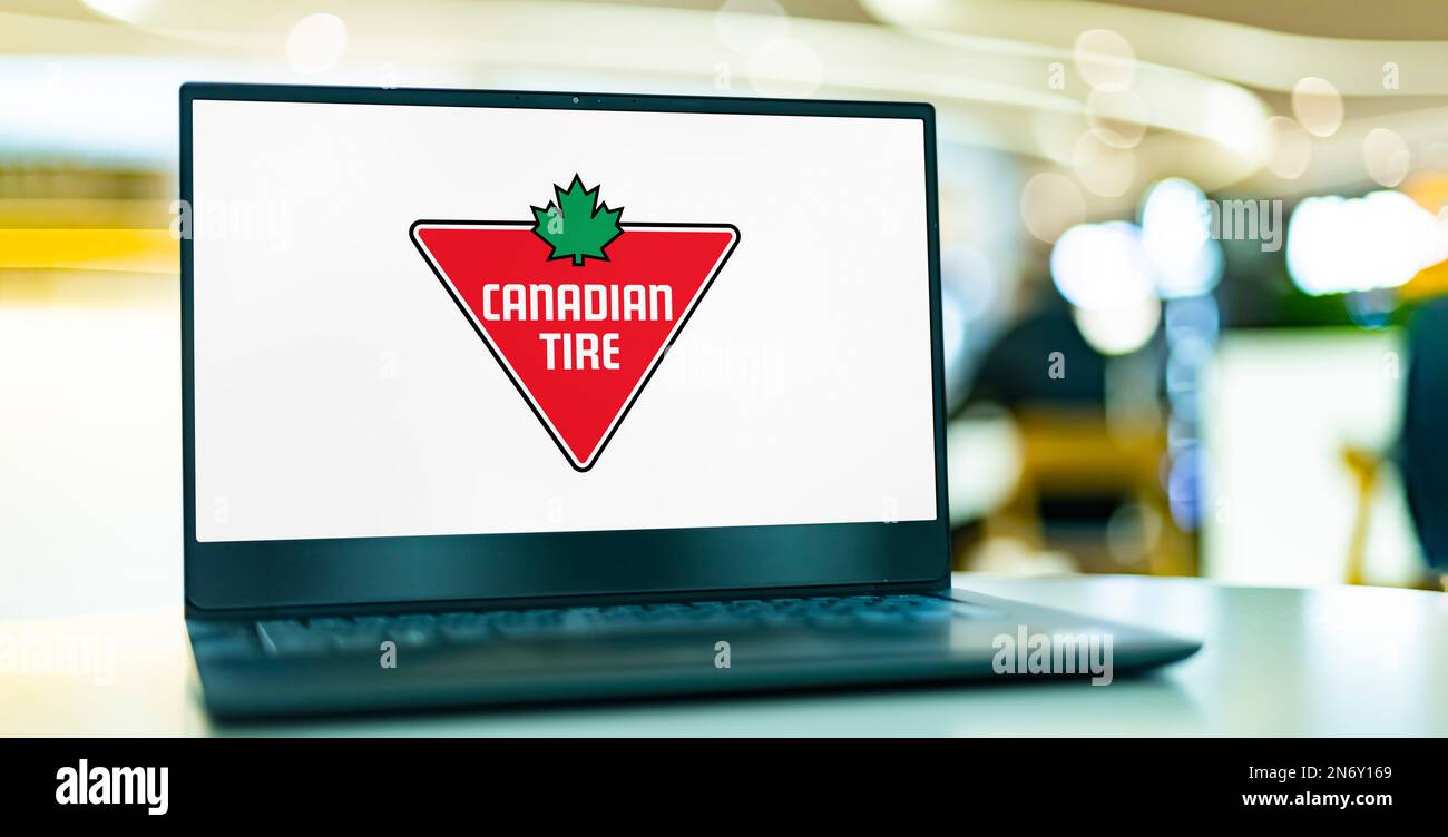 POZNAN, POL - NOV 22, 2022: Laptop computer displaying logo of Canadian Tire, a Canadian retail company which operates in the automotive, hardware, sp Stock Photo