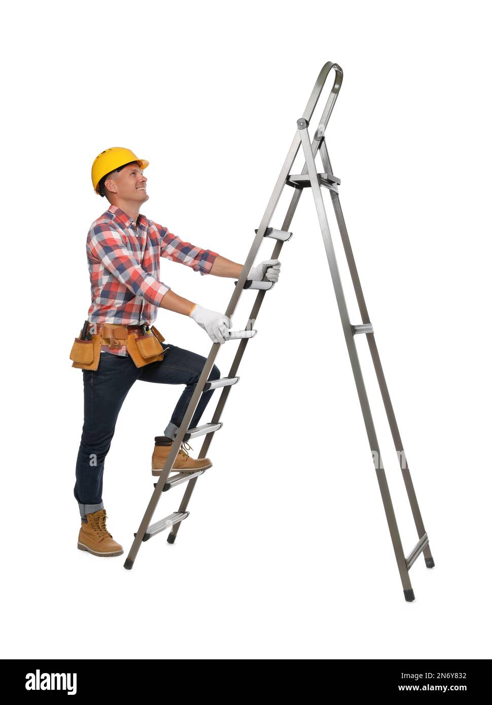 Professional constructor climbing ladder on white background Stock