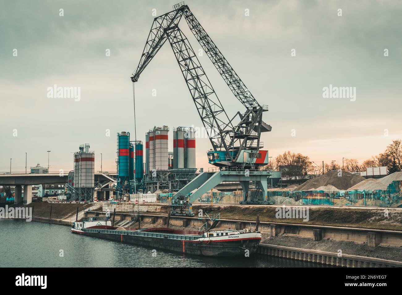 Mannheim, Germany - 26.03.2021: Gravel works with excavators in the port area of Mannheim Stock Photo