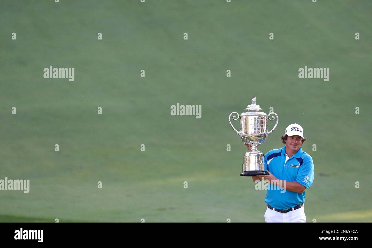 Jason Dufner holds up the Wanamaker Trophy after winning the PGA