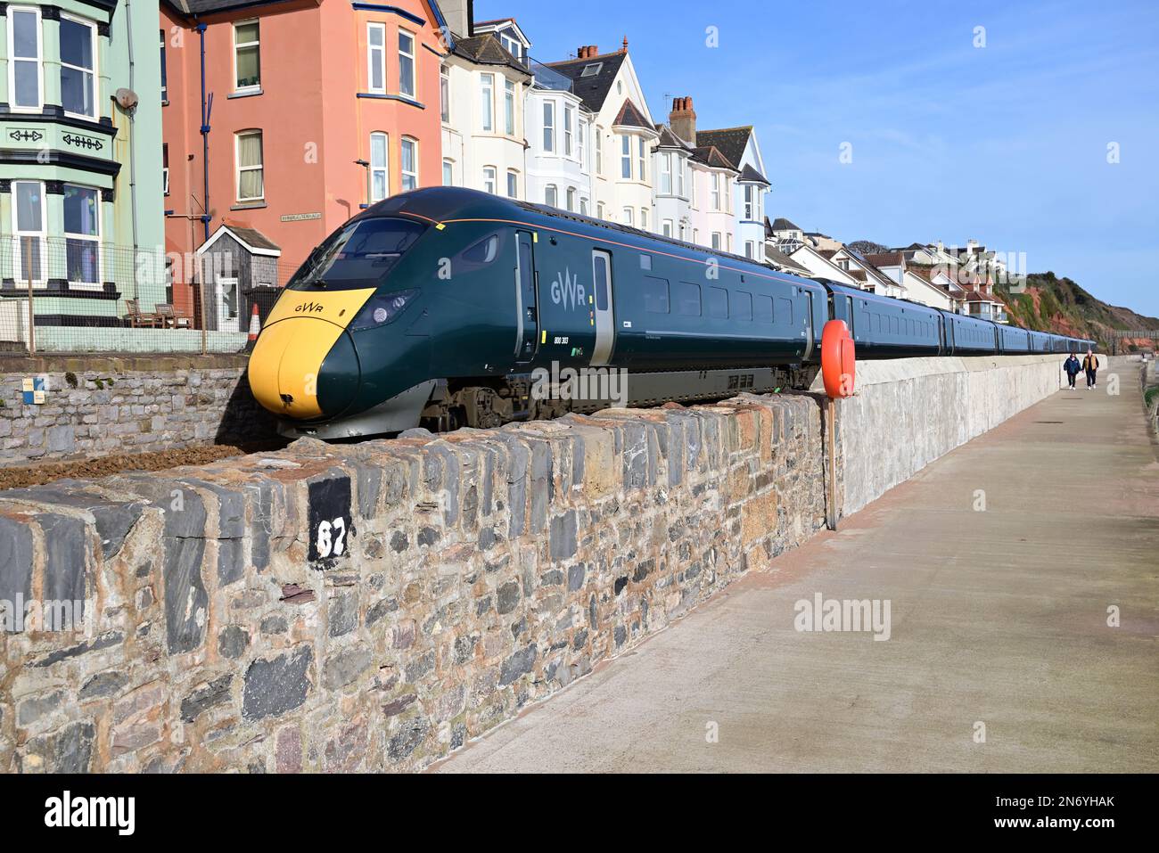 An Intercity Express Train passing the section of new seawall at Dawlish that was rebuilt after the great storm of February 2014. Stock Photo