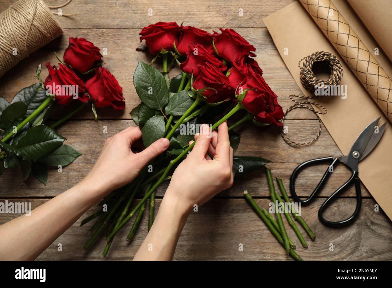 Woman making luxury bouquet of fresh roses at Stock Photo - Alamy
