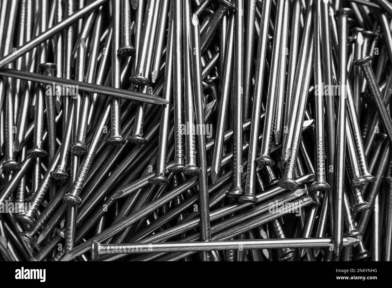 Top view of metal nails as background, closeup Stock Photo - Alamy