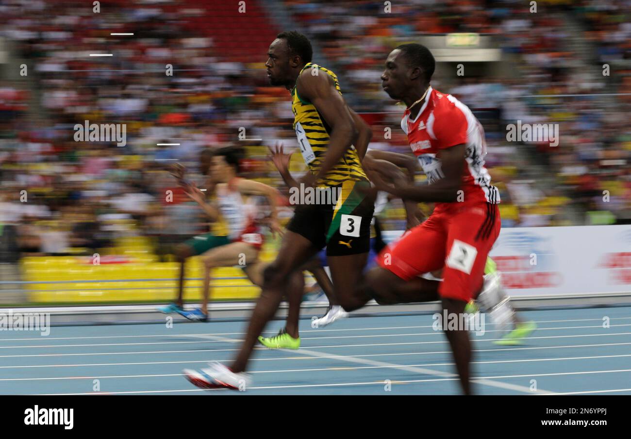 Jamaica's Usain Bolt, left, and Trinidad and Tobago's Rondel Sorrillo