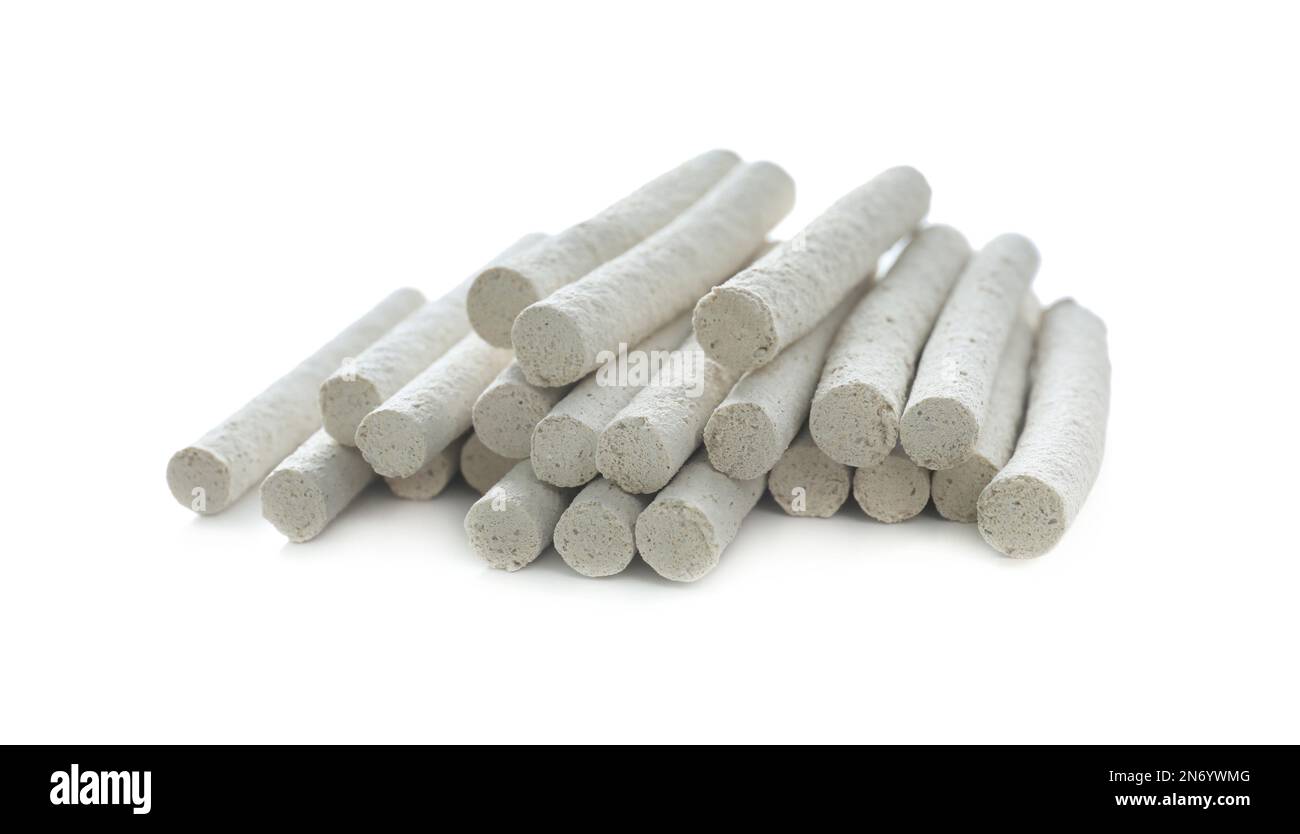 Heap of houseplant fertilizer spikes on white background Stock Photo