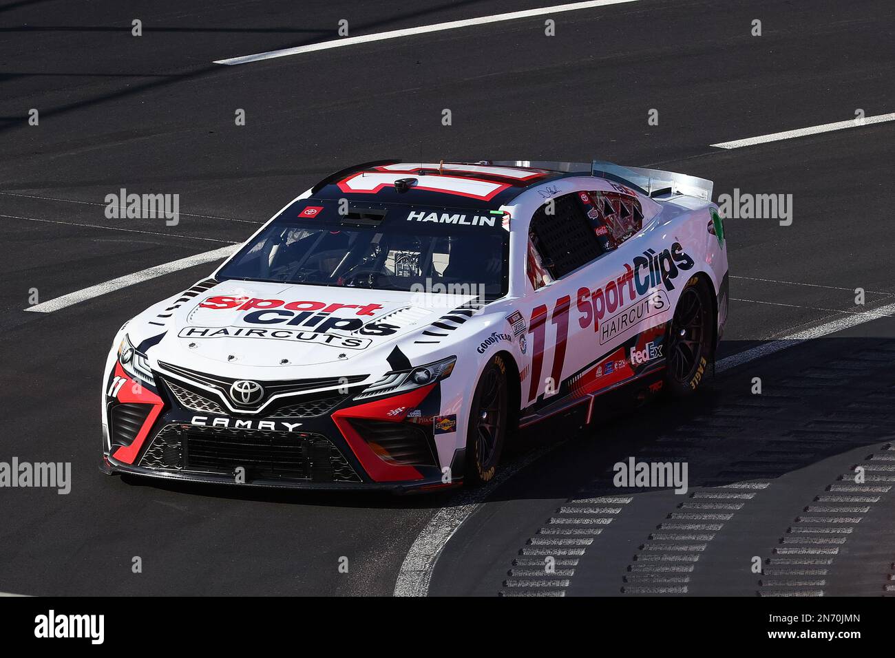 NASCAR Cup Series driver Denny Hamlin (11) races during the Busch Light Clash at the Los Angeles Coliseum, Sunday, Feb. 6 2023, in Los Angeles. (Kevin Stock Photo