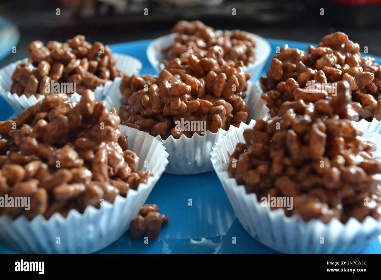 Chocolate Rice Krispie Cake Making Home Baking Rice Krispies In Mixing Bowl With Spoon Stock