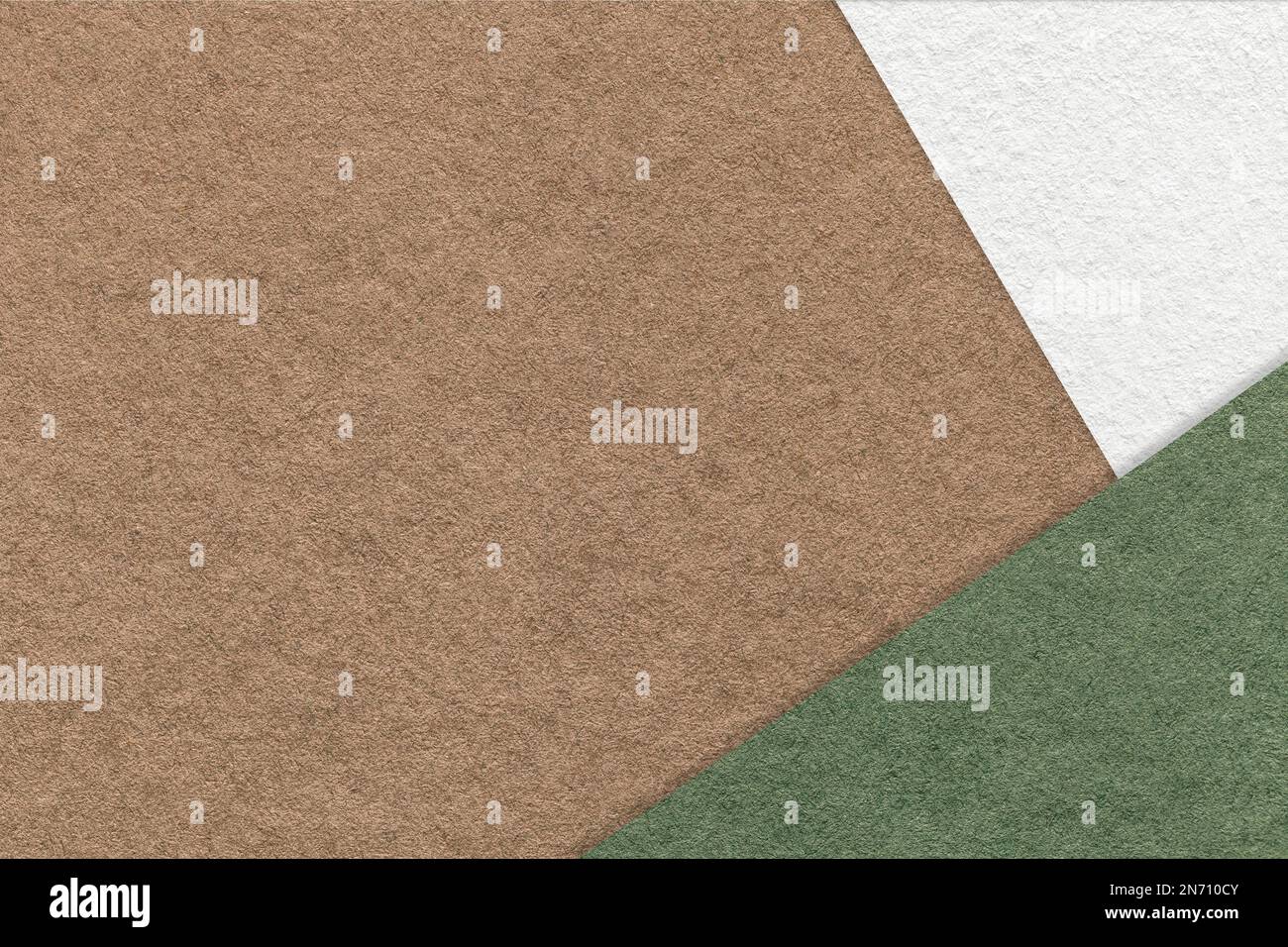 Texture of craft brown color paper background with white and green
