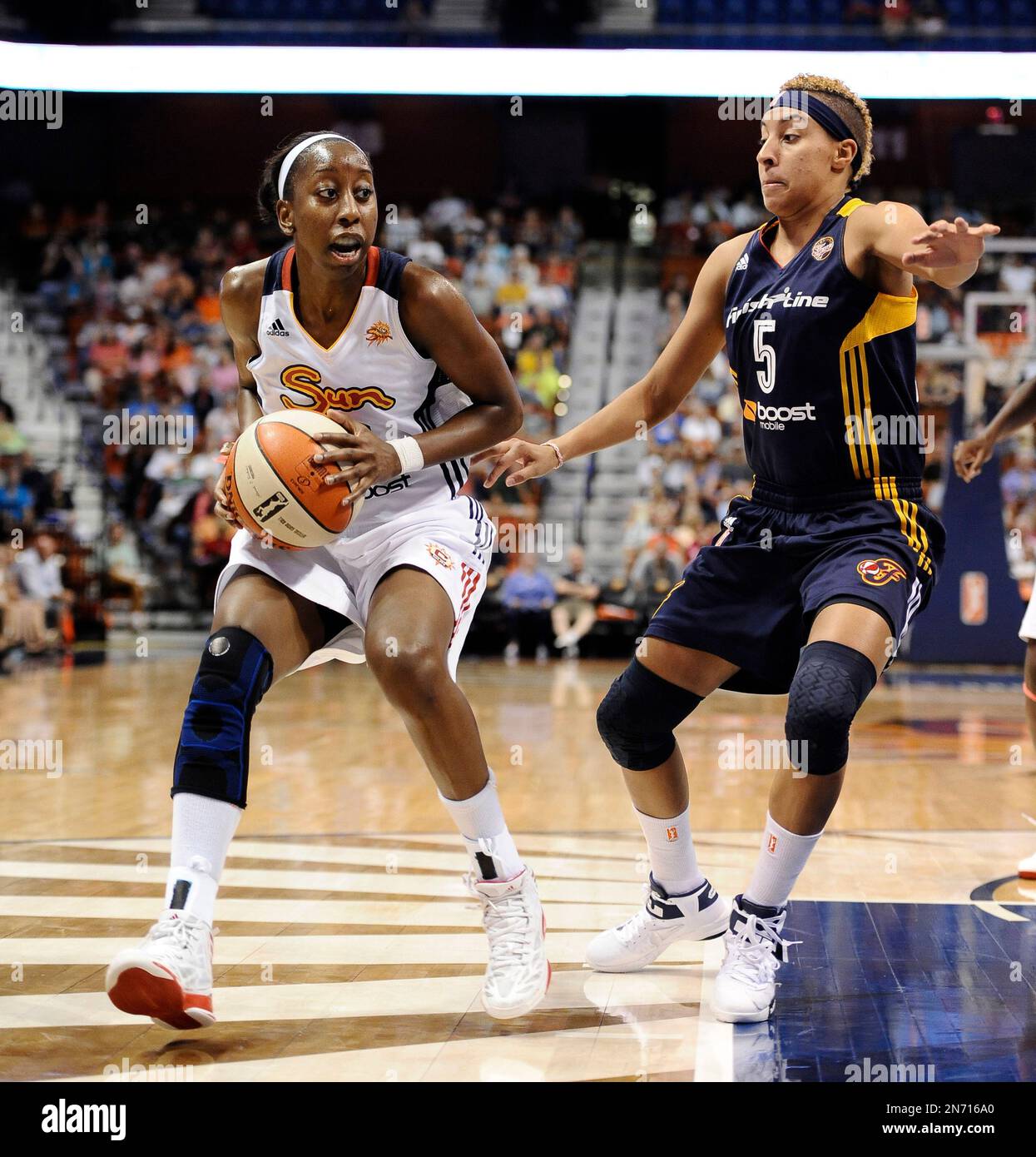 Connecticut Sun's Allison Hightower, left, is pressured by Indiana ...