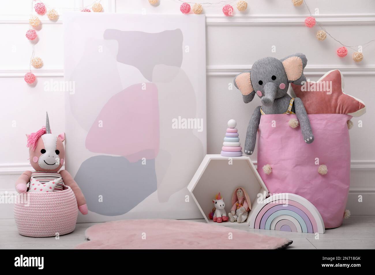 Beautiful picture and cute toys in baby room. Interior design Stock ...