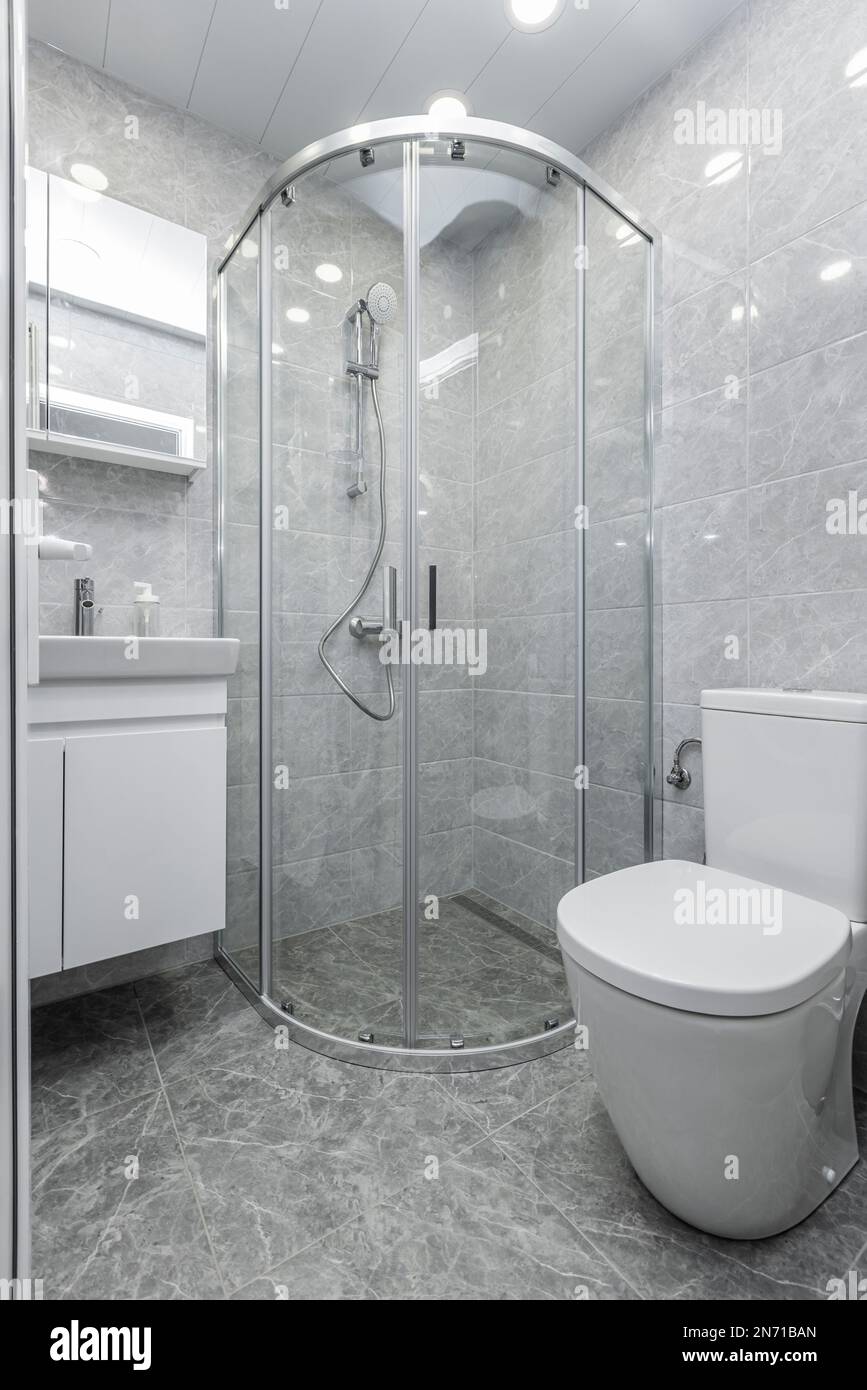 Modern shower room with gray tiles Stock Photo Alamy