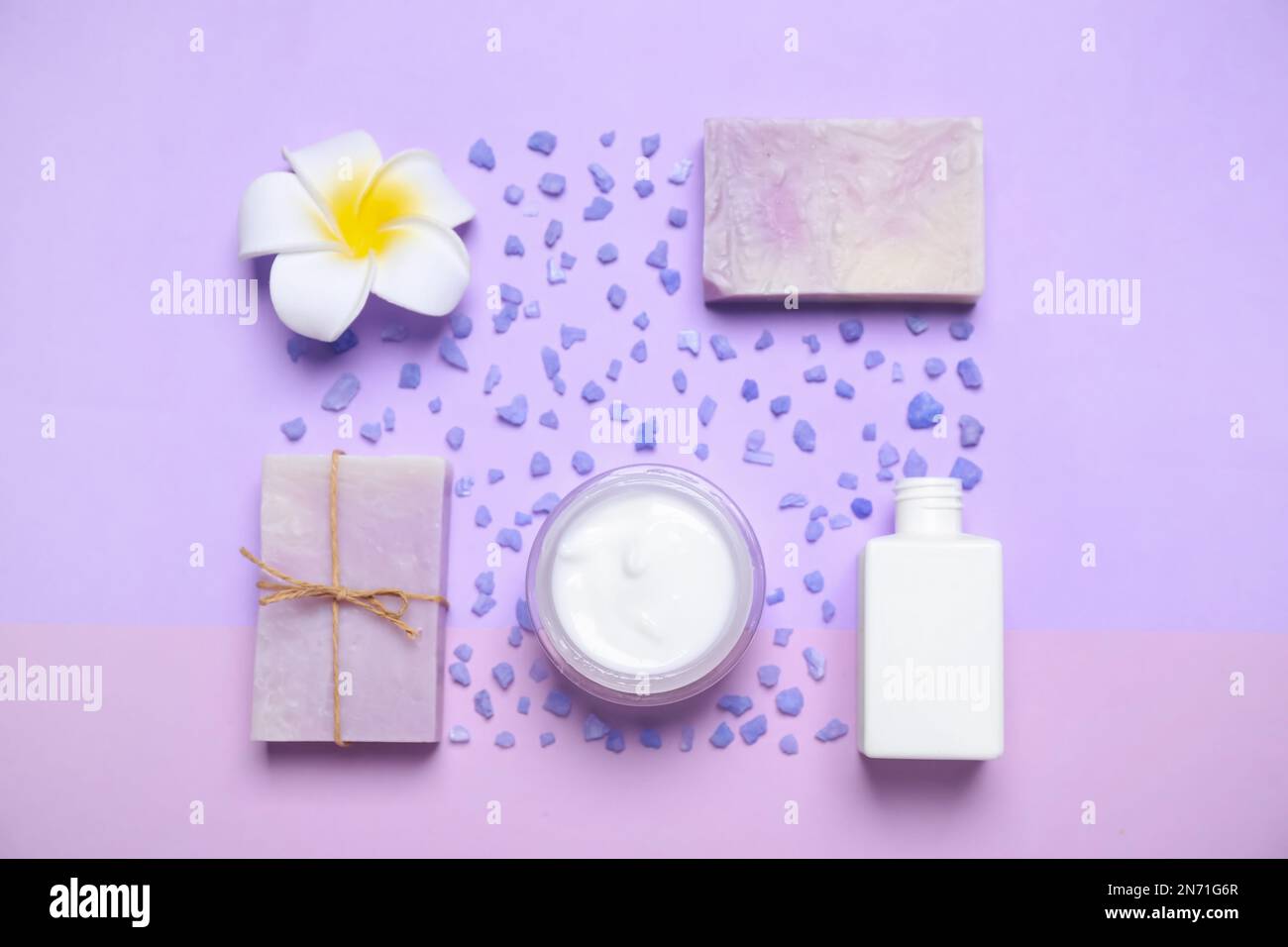 Flat lay composition with spa items on violet background Stock Photo