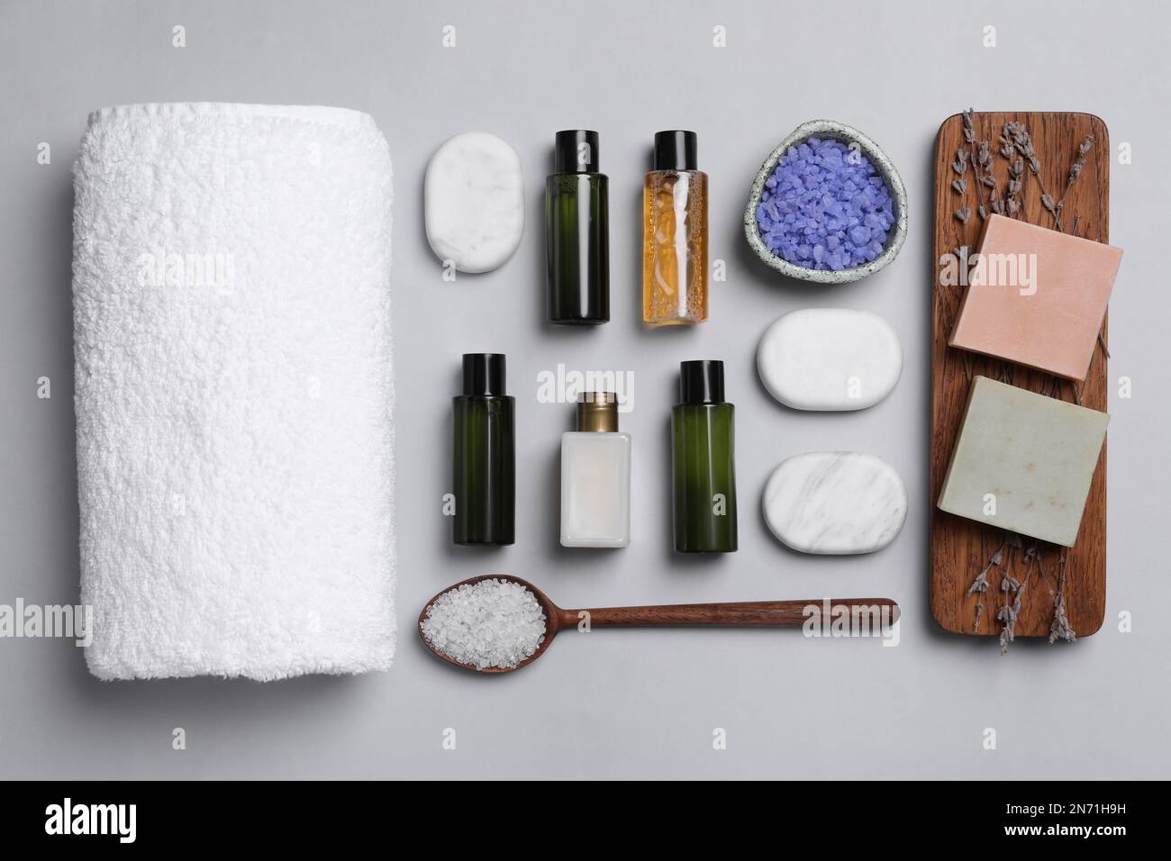 Flat lay composition with cosmetic products on light grey background ...