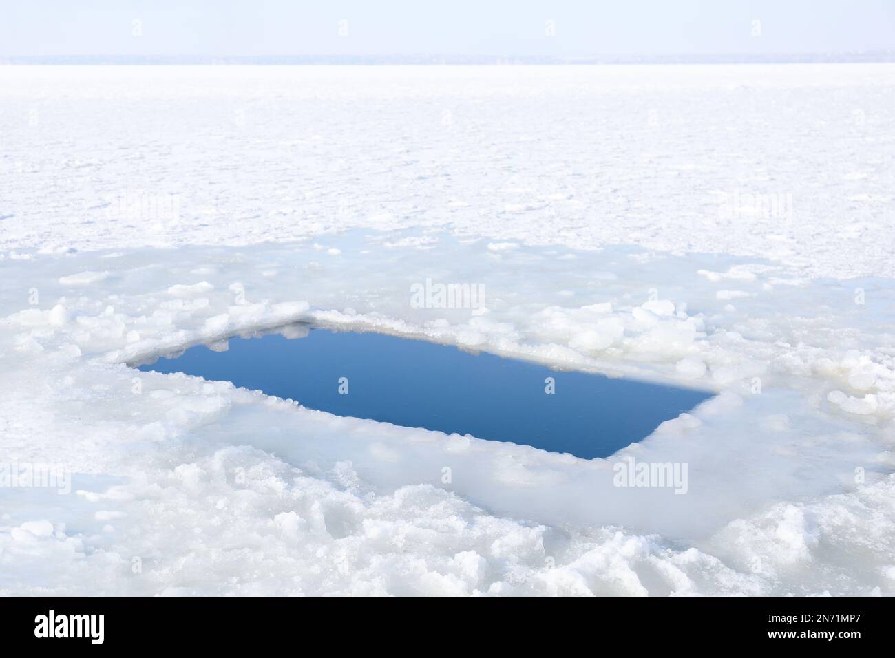 Ice hole in river on winter day. Baptism ritual Stock Photo Alamy