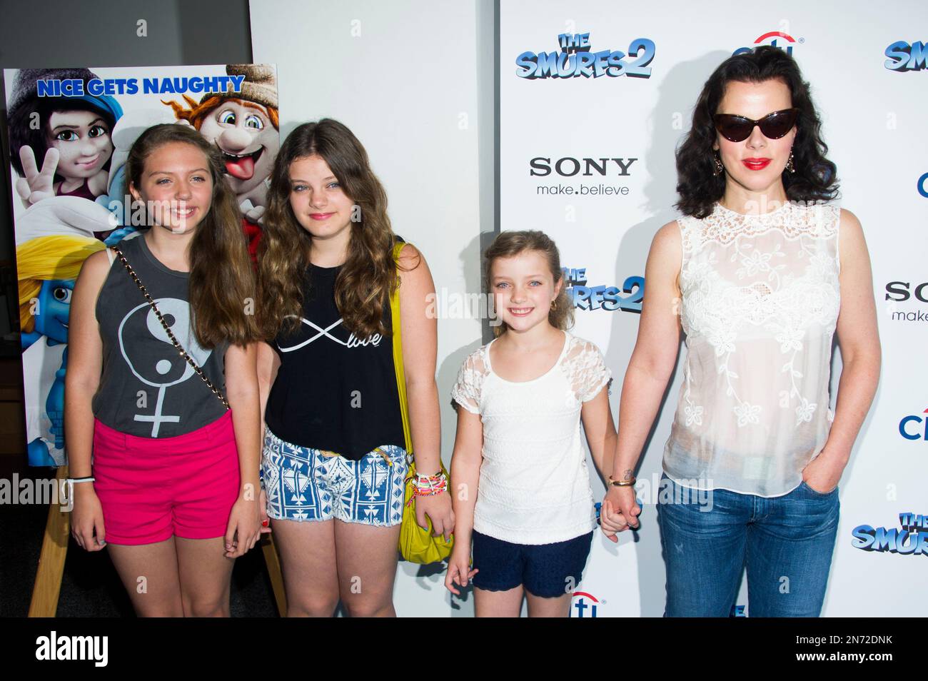 Debi Mazar and family attend "The Smurfs 2" premiere on Sunday, July 28