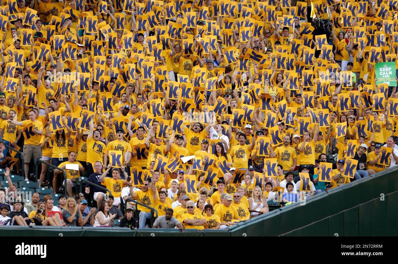 Seattle Mariners King's Court fans cheer a strike out by starting pitcher Felix  Hernandez against the Minnesota Twins in the third inning of a baseball  game Friday, July 26, 2013, in Seattle. (
