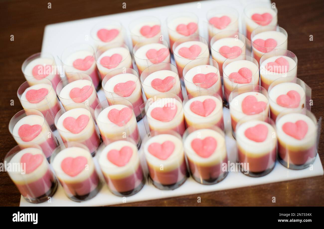 chocolate sweets - white chocolate with pink hearts Stock Photo