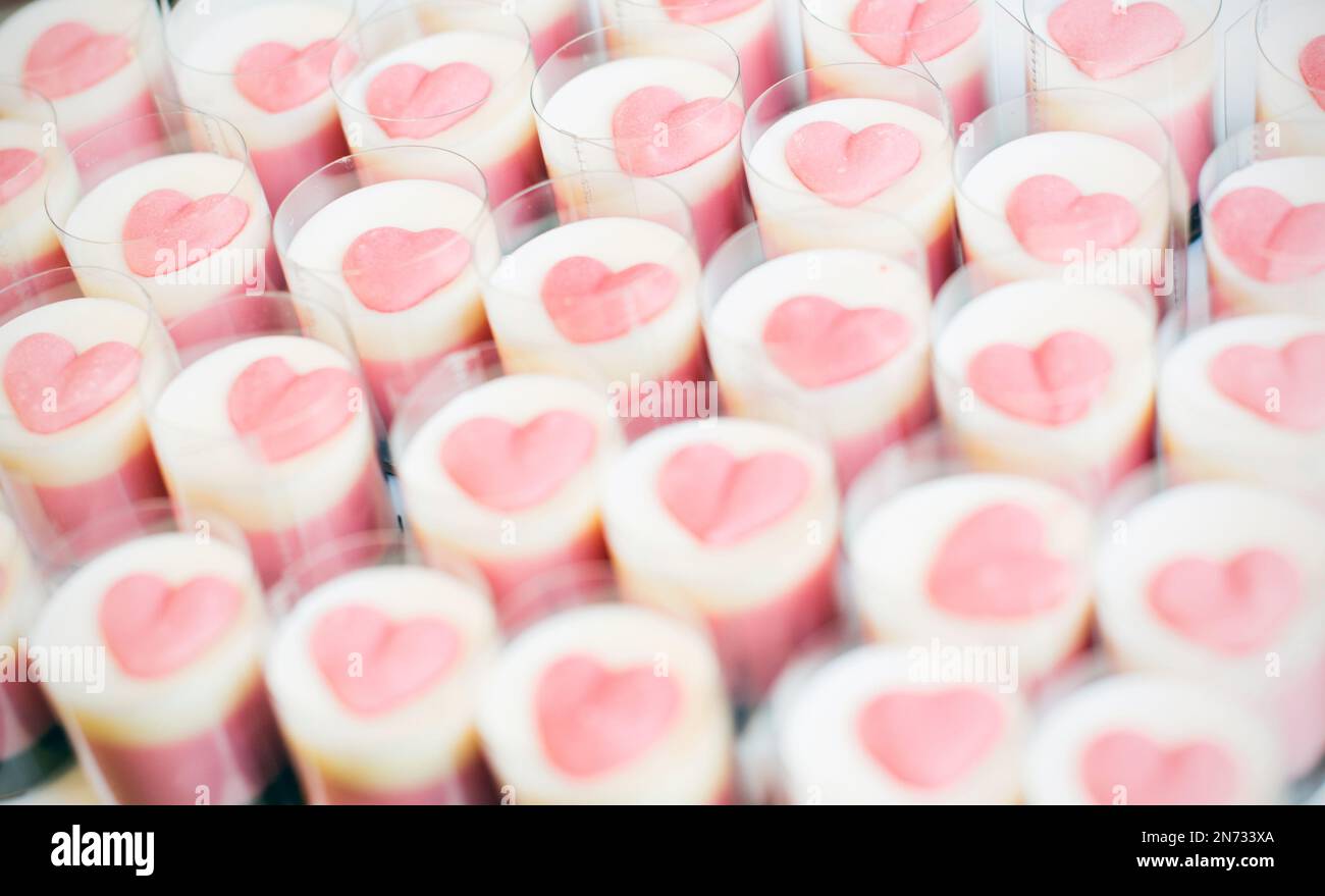 chocolate sweets - white chocolate with pink hearts Stock Photo