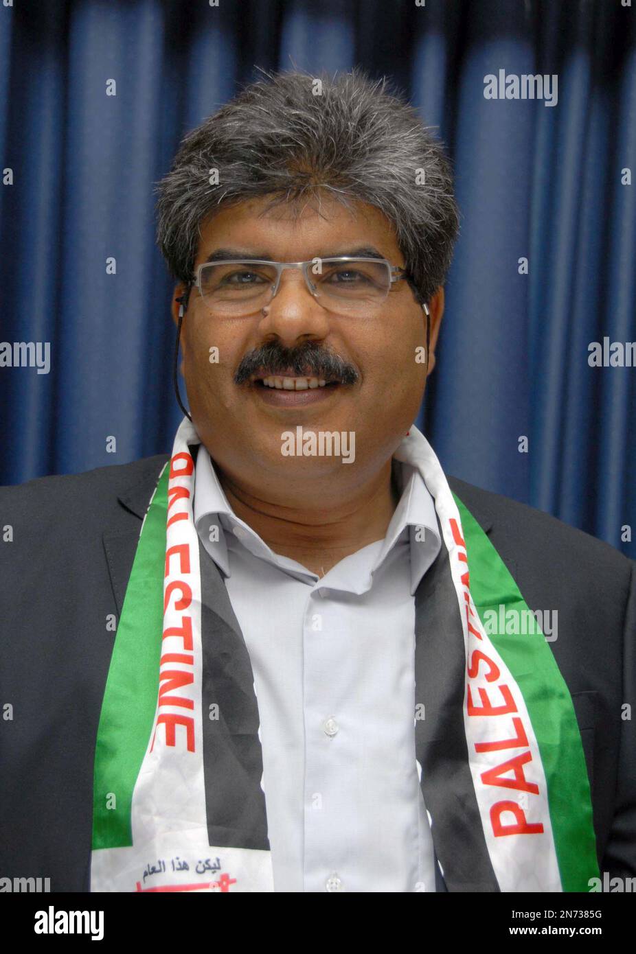 FILE - In this 2012 file photo, Tunisian lawmaker Mohammed Brahmi poses ...