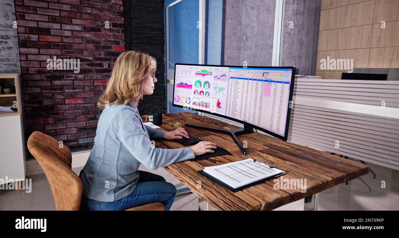 Business Data Audit Spreadsheet On Analyst Computer Stock Photo