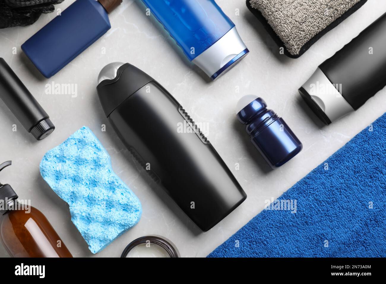 Flat lay composition with men's cosmetics on light grey marble ...