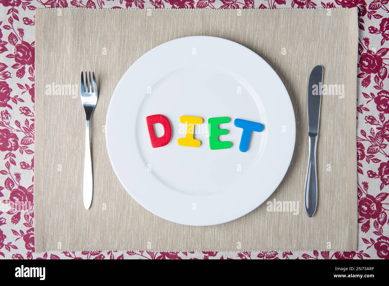 Concept: healthy food and diet - word DIET on a white plate Stock Photo